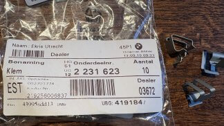 Klem voor klepje van de trekhaak